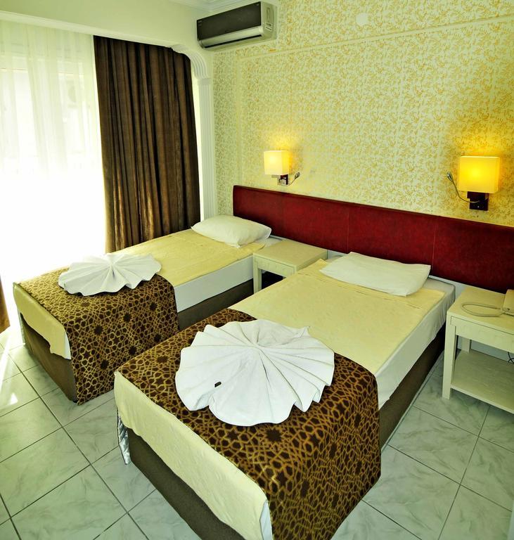 Sun Kiss Hotel Side Exterior foto